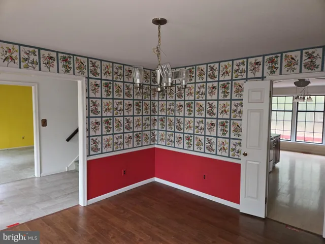 a kitchen with a refrigerator stove and microwave