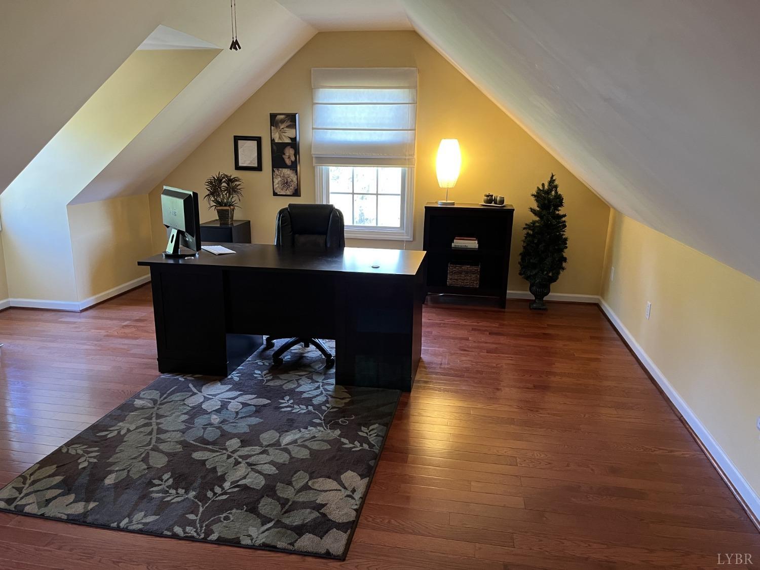 1959 Founding Way Road Goode, VA 24556 - Photo 33 of 65 a living room with furniture and a wooden floor