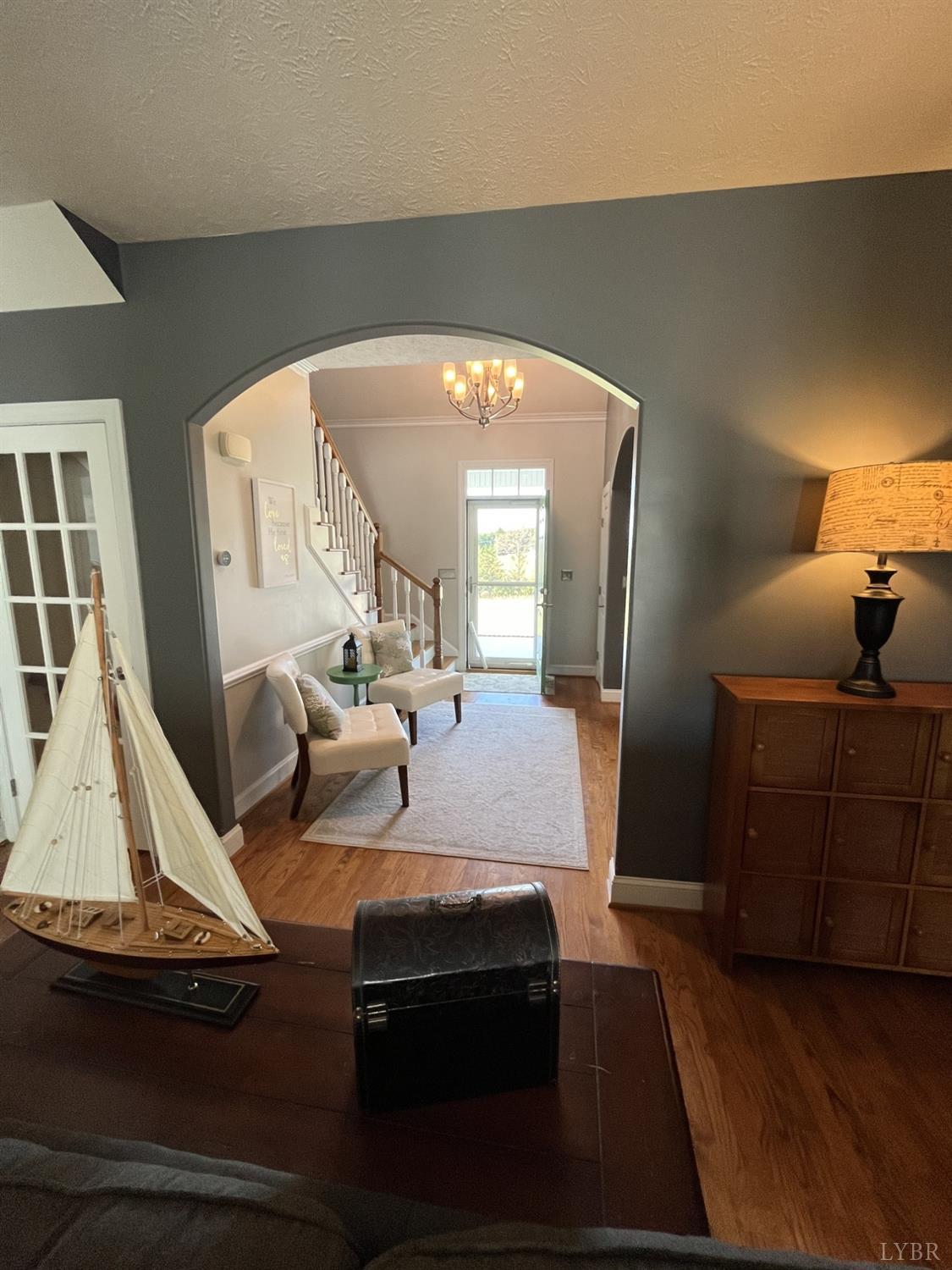 1959 Founding Way Road Goode, VA 24556 - Photo 6 of 65 a bedroom with bed and window