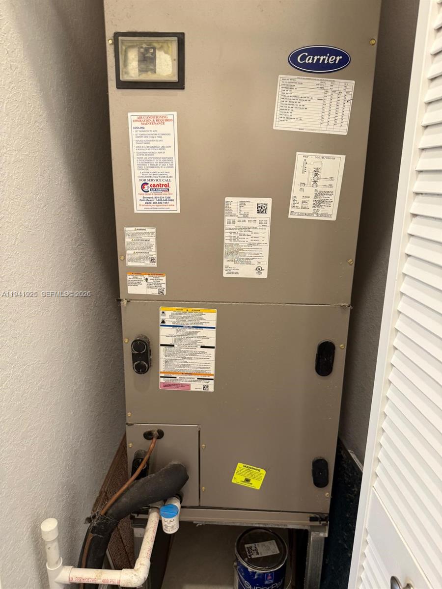 887 Northeast 211th Street Miami, FL 33179 - Photo 24 of 25 view of a bathroom with a window