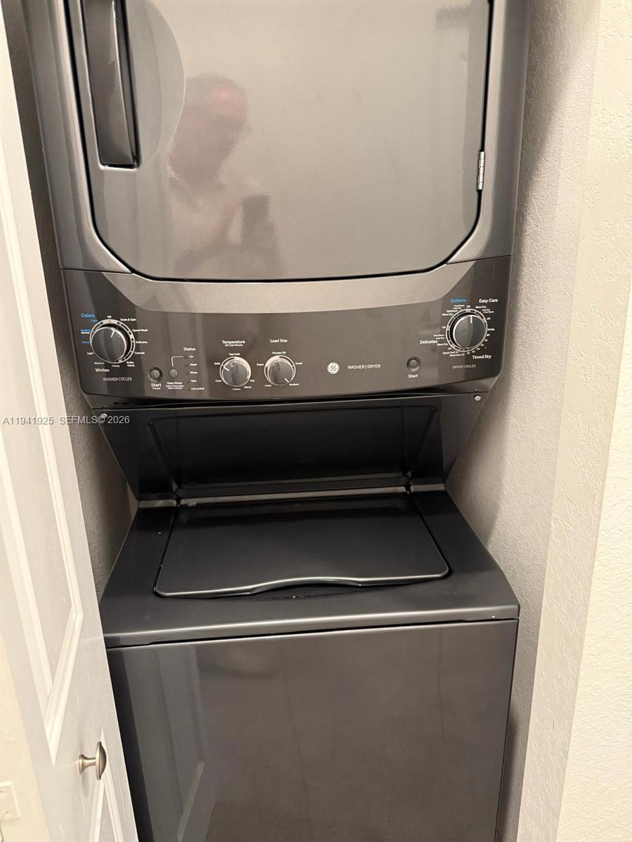 887 Northeast 211th Street Miami, FL 33179 - Photo 25 of 25 a close view of washer and dryer