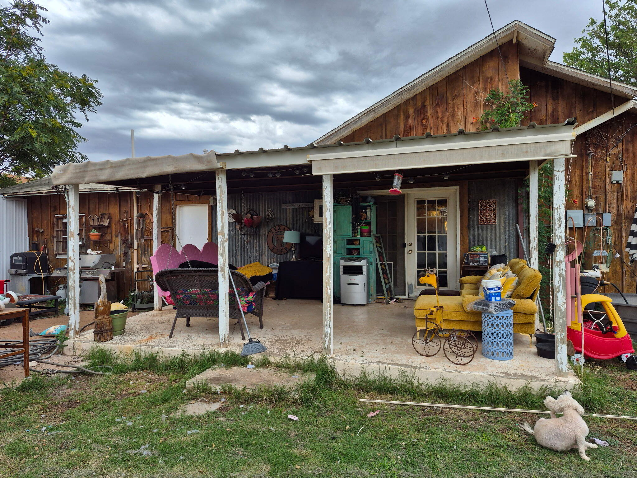 735 South 12th Street Slaton, TX 79364 - Photo 12 of 16 a view of people sitting in front of retail shop