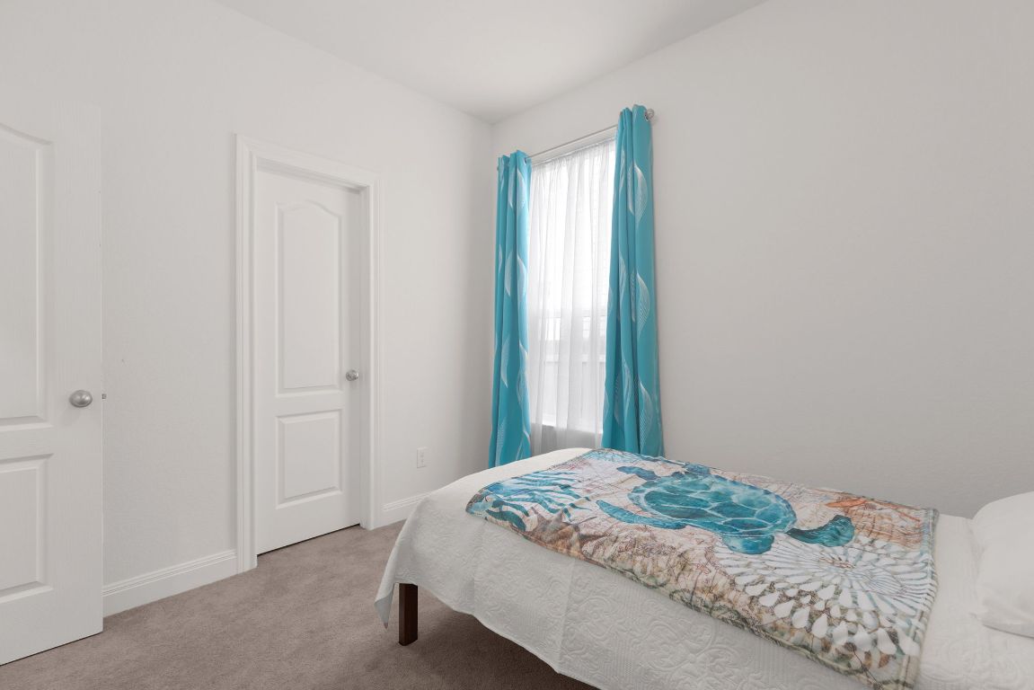 237 Benmyrtle Trail Georgetown, TX 78626 - Photo 11 of 22 Carpeted bedroom with baseboards