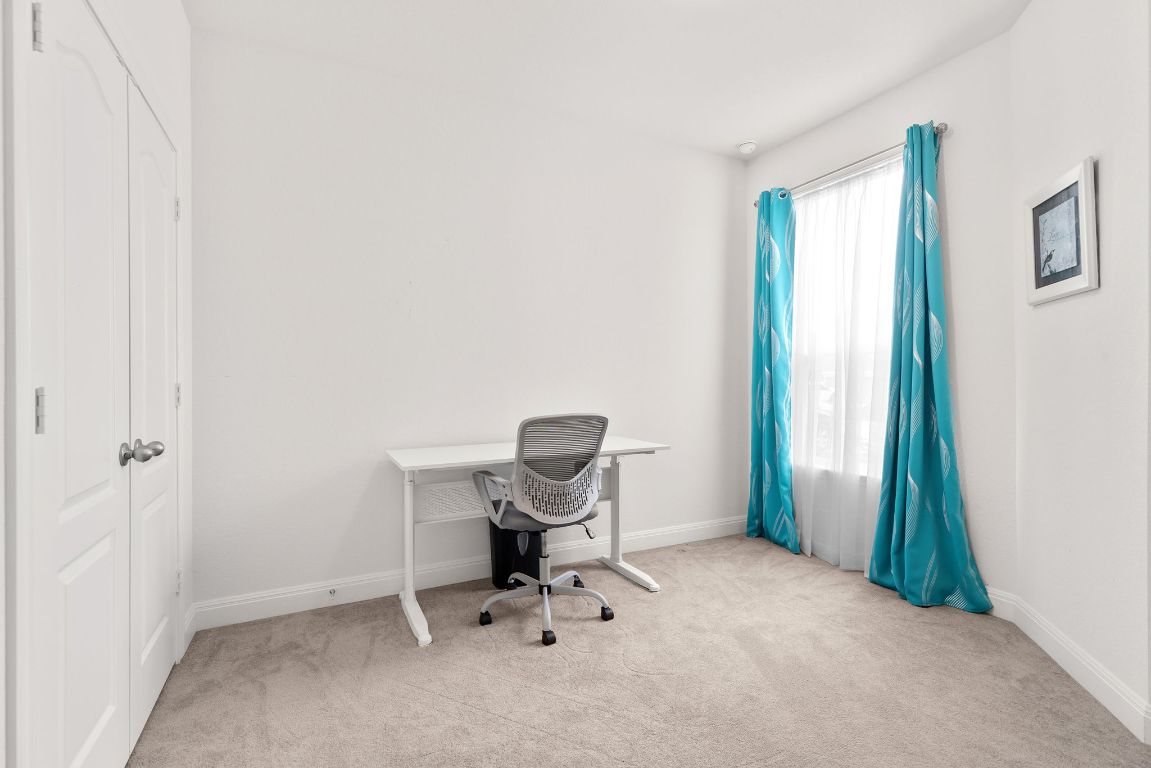 237 Benmyrtle Trail Georgetown, TX 78626 - Photo 12 of 22 Office area with carpet floors and baseboards