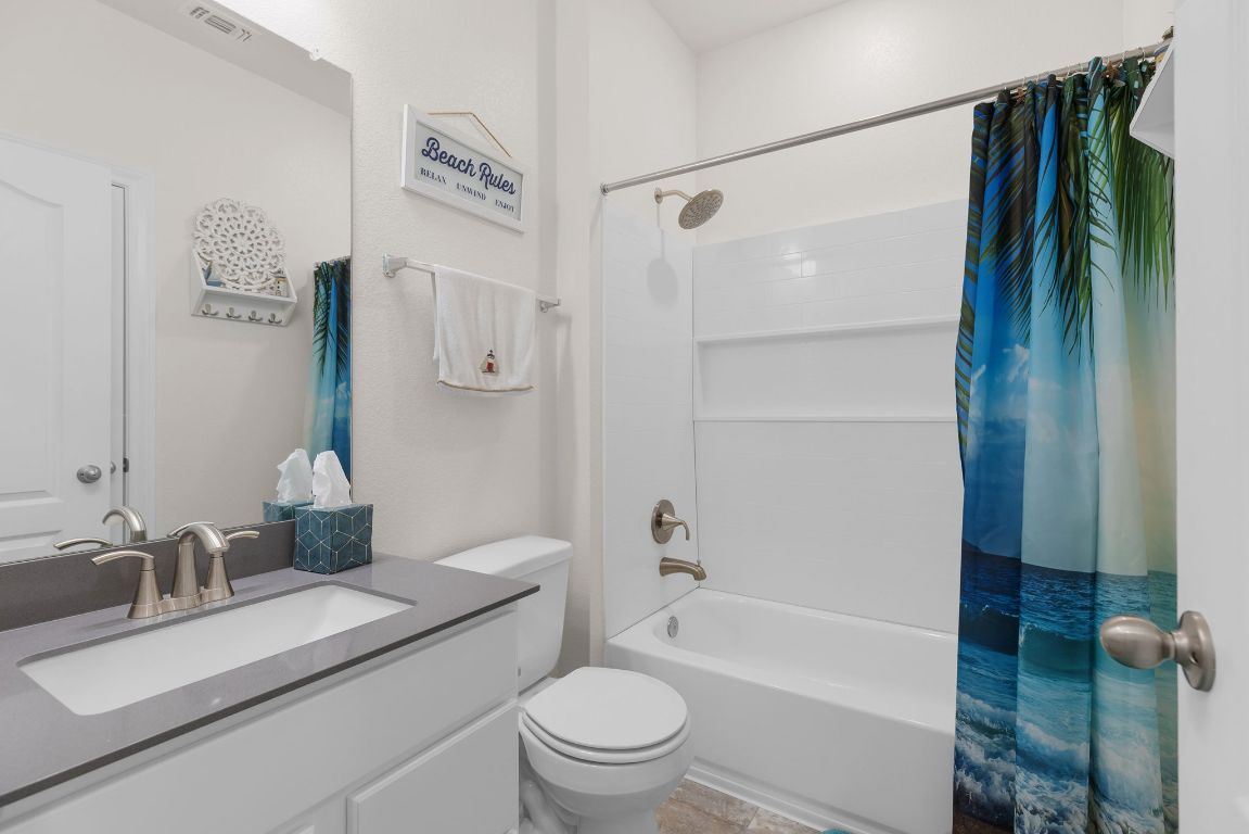 237 Benmyrtle Trail Georgetown, TX 78626 - Photo 14 of 22 Full bathroom featuring vanity and shower / tub combo with curtain