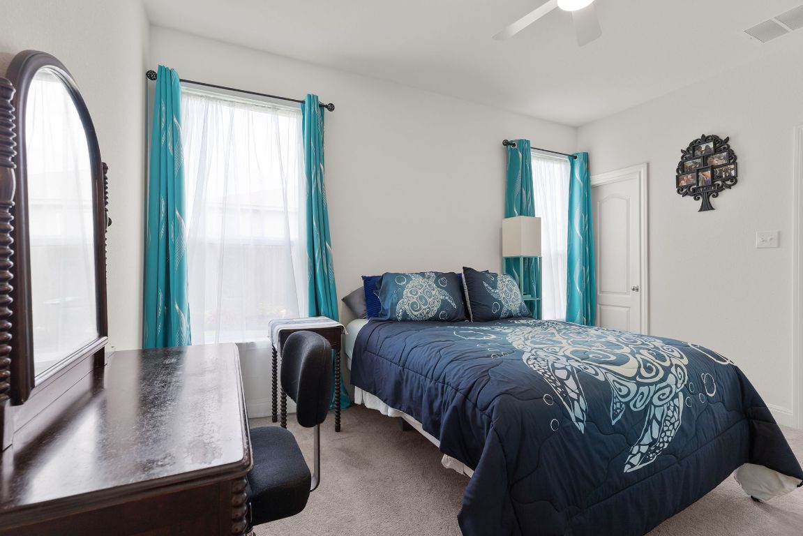 237 Benmyrtle Trail Georgetown, TX 78626 - Photo 17 of 22 Carpeted bedroom with a ceiling fan
