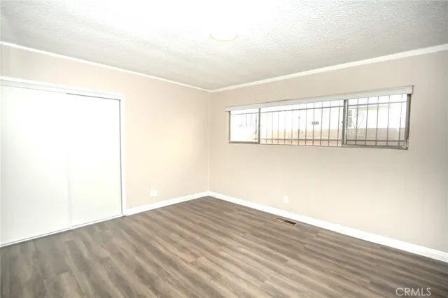 a bathroom with a sink vanity and a mirror