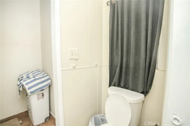 a view of a pathway of a house with wooden floor