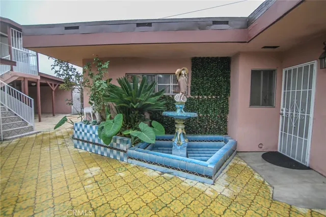 a view of swimming pool with patio