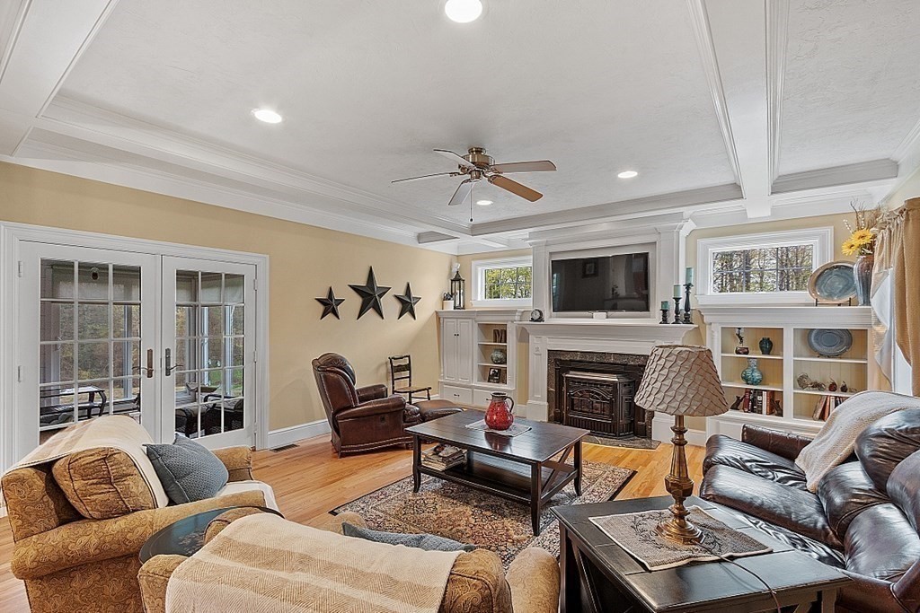 64 Walnut Street Rutland, MA 01543 - Photo 19 of 40 a living room with furniture fireplace and a flat screen tv