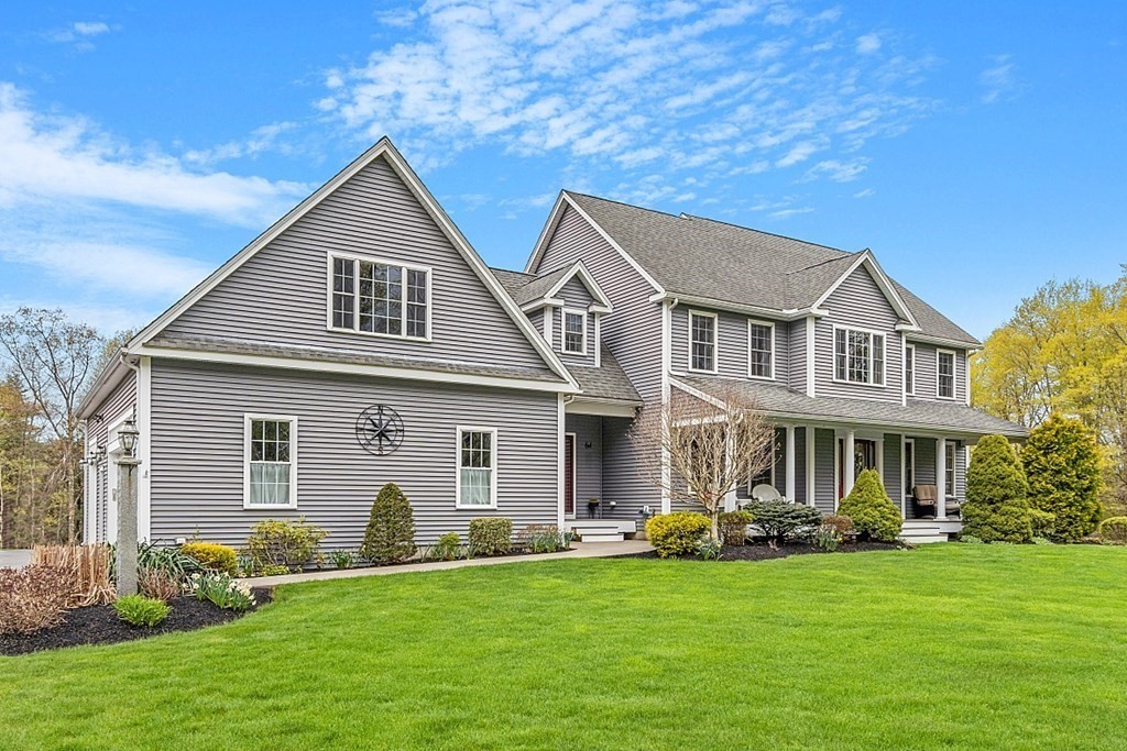 64 Walnut Street Rutland, MA 01543 - Photo 2 of 40 a view of a house with a yard