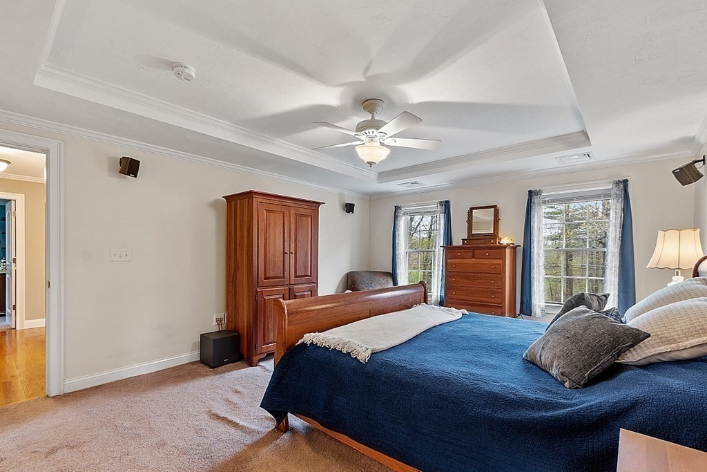 64 Walnut Street Rutland, MA 01543 - Photo 30 of 40 a bedroom with a large bed closet and window