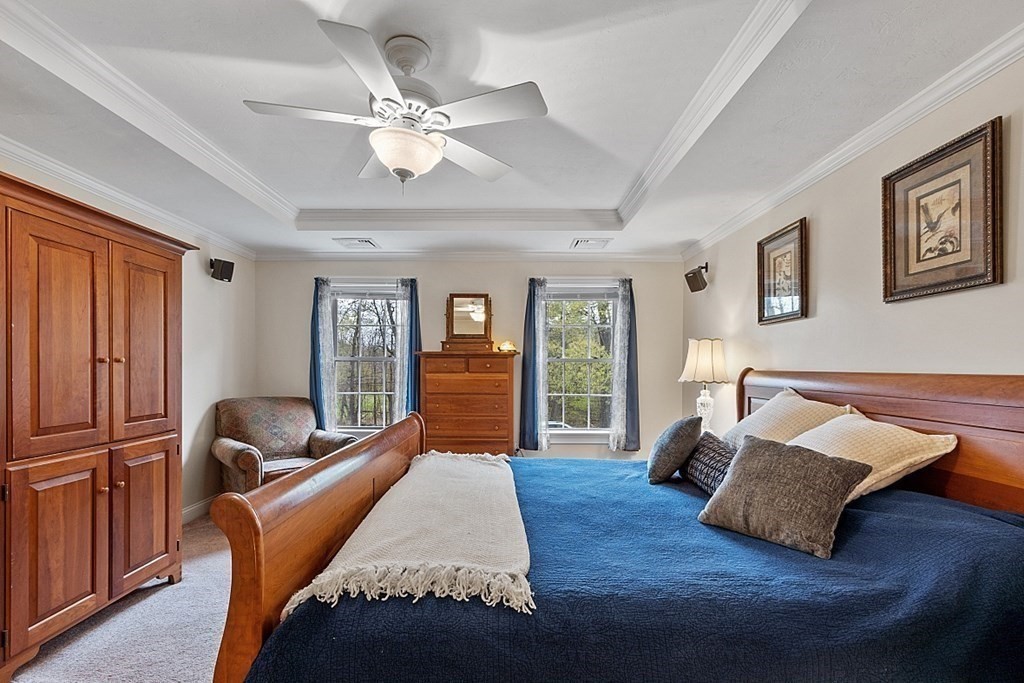 64 Walnut Street Rutland, MA 01543 - Photo 31 of 40 a bedroom with a bed and wooden floor
