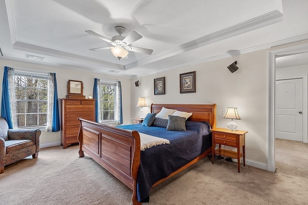 64 Walnut Street Rutland, MA 01543 - Photo 32 of 40 a bedroom with a bed and a large window