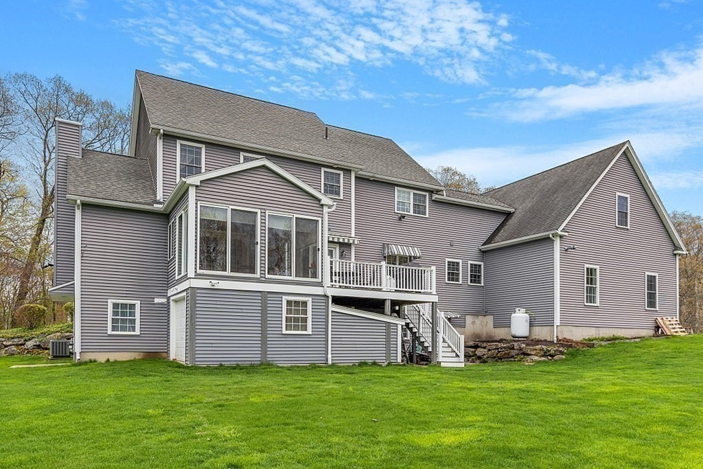 64 Walnut Street Rutland, MA 01543 - Photo 37 of 40 a front view of house with yard and front view of a house