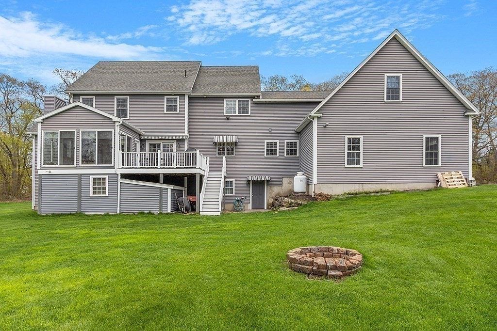 64 Walnut Street Rutland, MA 01543 - Photo 38 of 40 a house view with a garden space