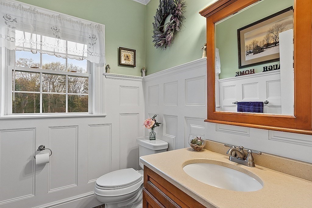 64 Walnut Street Rutland, MA 01543 - Photo 8 of 40 a bathroom with a sink mirror and a toilet