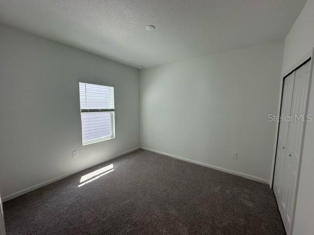4734 Southwest 83rd Loop Ocala, FL 34476 - Photo 21 of 28 an empty room with windows