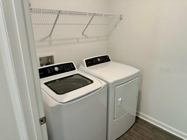 4734 Southwest 83rd Loop Ocala, FL 34476 - Photo 23 of 28 a utility room with dryer and washer
