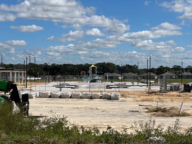 4734 Southwest 83rd Loop Ocala, FL 34476 - Photo 27 of 28 a view of pool with ocean view