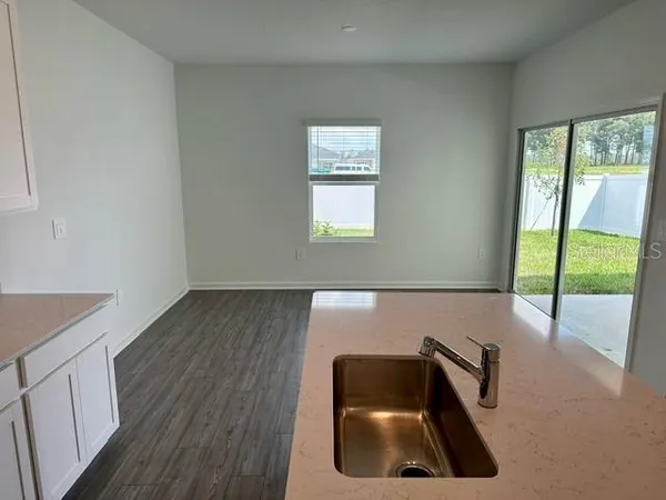 a room with window and wooden floor
