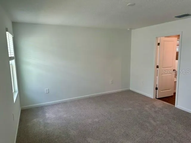 an empty room with an empty room
