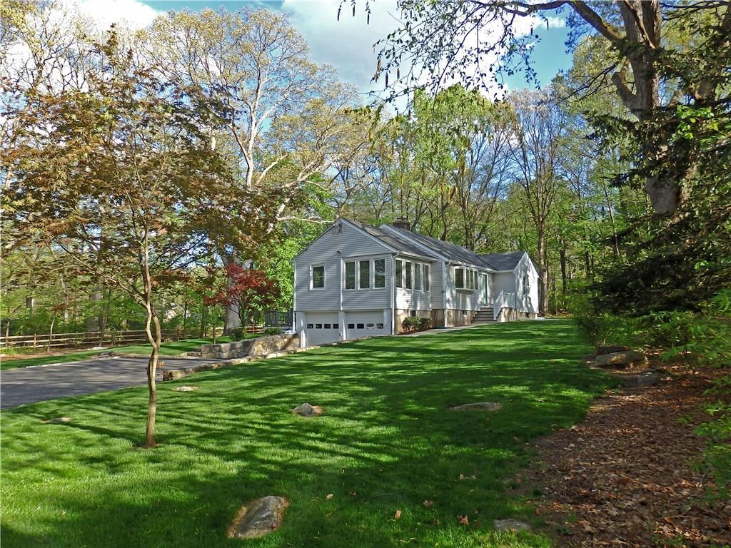 198 1/2 West Rocks Road Norwalk, CT 06851 - Photo 1 of 1 a house with green field in front of it