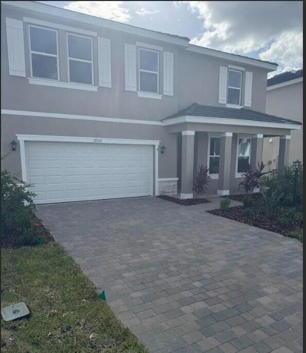 17936 Tavernside Trail Lakewood Ranch, FL 34211 - Photo 2 of 2 a view of backyard with plants and outdoor space
