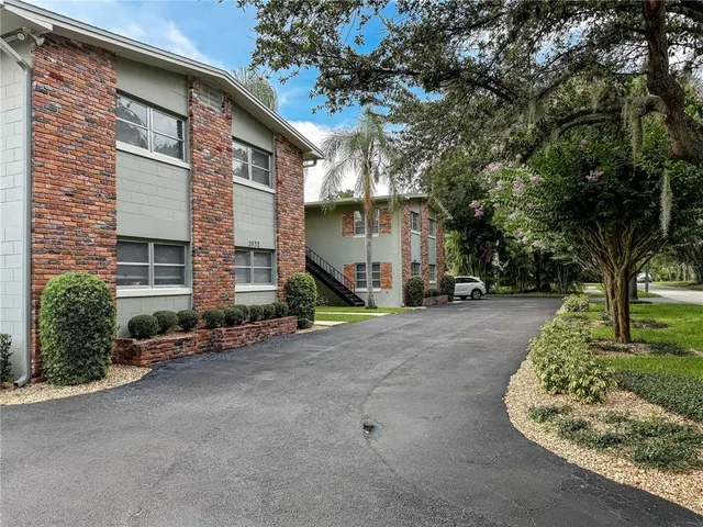 a view of a house with a street