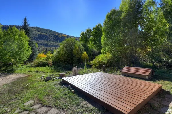 a view of a backyard with a garden