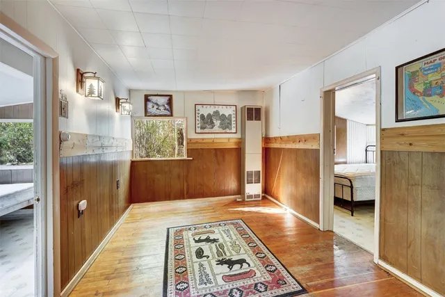 a living room with furniture and a rug
