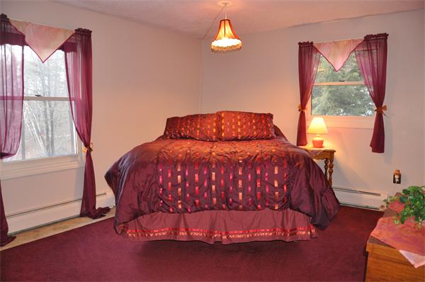 108 Clark Road Sturbridge, MA 01518 - Photo 13 of 30 a bedroom with a bed and a window