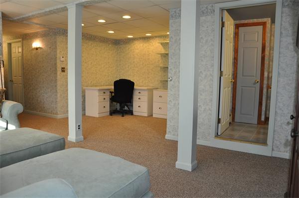 108 Clark Road Sturbridge, MA 01518 - Photo 21 of 30 a bedroom with a bed and a bathroom