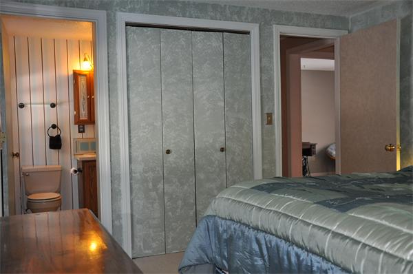 108 Clark Road Sturbridge, MA 01518 - Photo 10 of 30 a bedroom with a bed and a shower