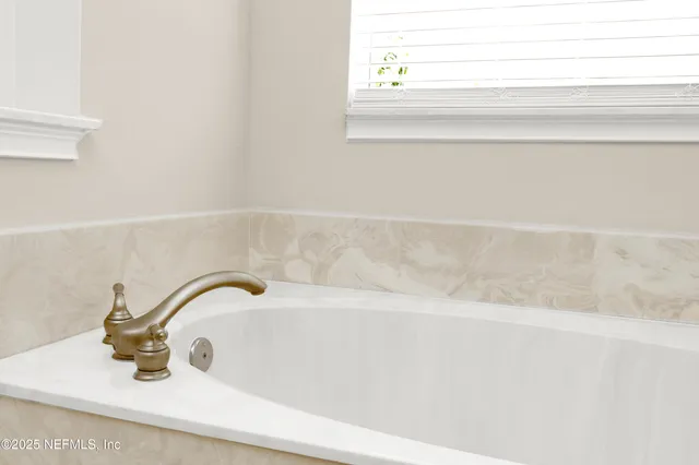 a bathroom with a bathtub