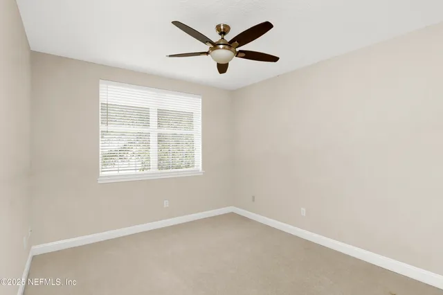 a bathroom with a bathtub shower sink and toilet