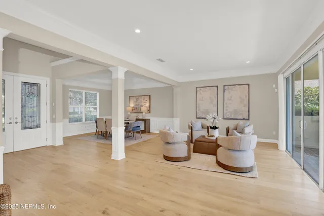 a view of a dining room with furniture window and outside view