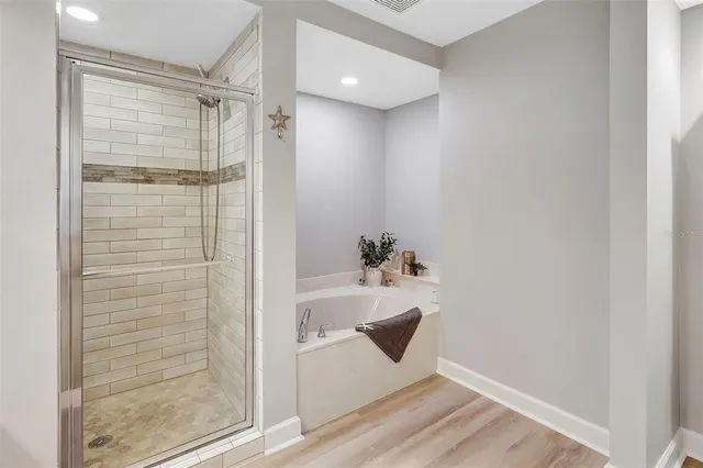 a bedroom with a bed and a cabinets