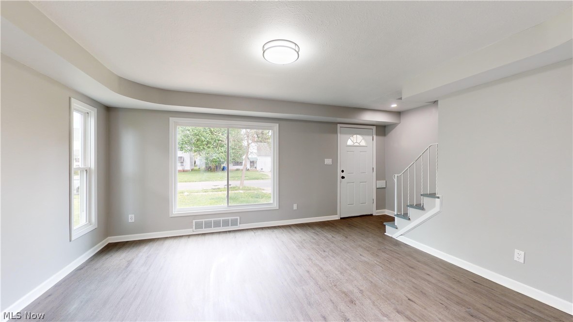 3932 Strandhill Road Cleveland, OH 44128 - Photo 10 of 27 Spare room featuring hardwood / wood-style floors