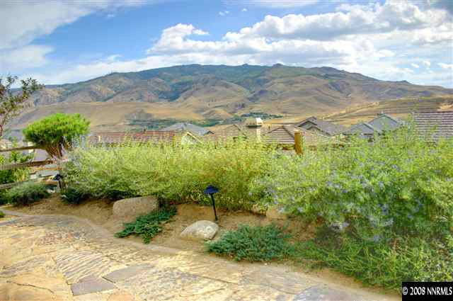 1285 Tarleton Way Reno, NV 89523 - Photo 3 of 9 a view of a garden with mountains in the background