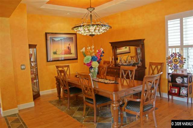 1285 Tarleton Way Reno, NV 89523 - Photo 7 of 9 a view of a dining room with furniture and chandelier