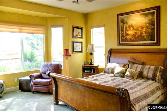 1285 Tarleton Way Reno, NV 89523 - Photo 9 of 9 a bedroom with a bed and a couch