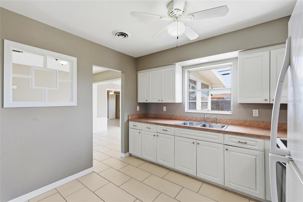 363 Glen Oak Road Venice, FL 34293 - Photo 22 of 53 a spacious bathroom with a double vanity sink and a mirror