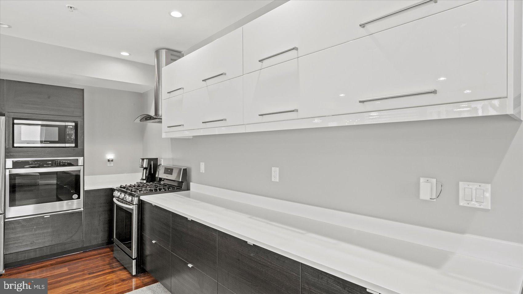 3145 Baybriar Road Dundalk, MD 21222 - Photo 26 of 54 a kitchen with cabinets and steel appliances