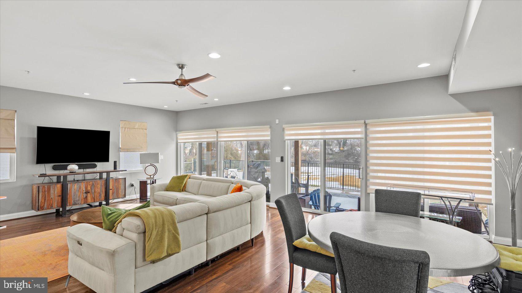 3145 Baybriar Road Dundalk, MD 21222 - Photo 28 of 54 a living room with furniture and a flat screen tv