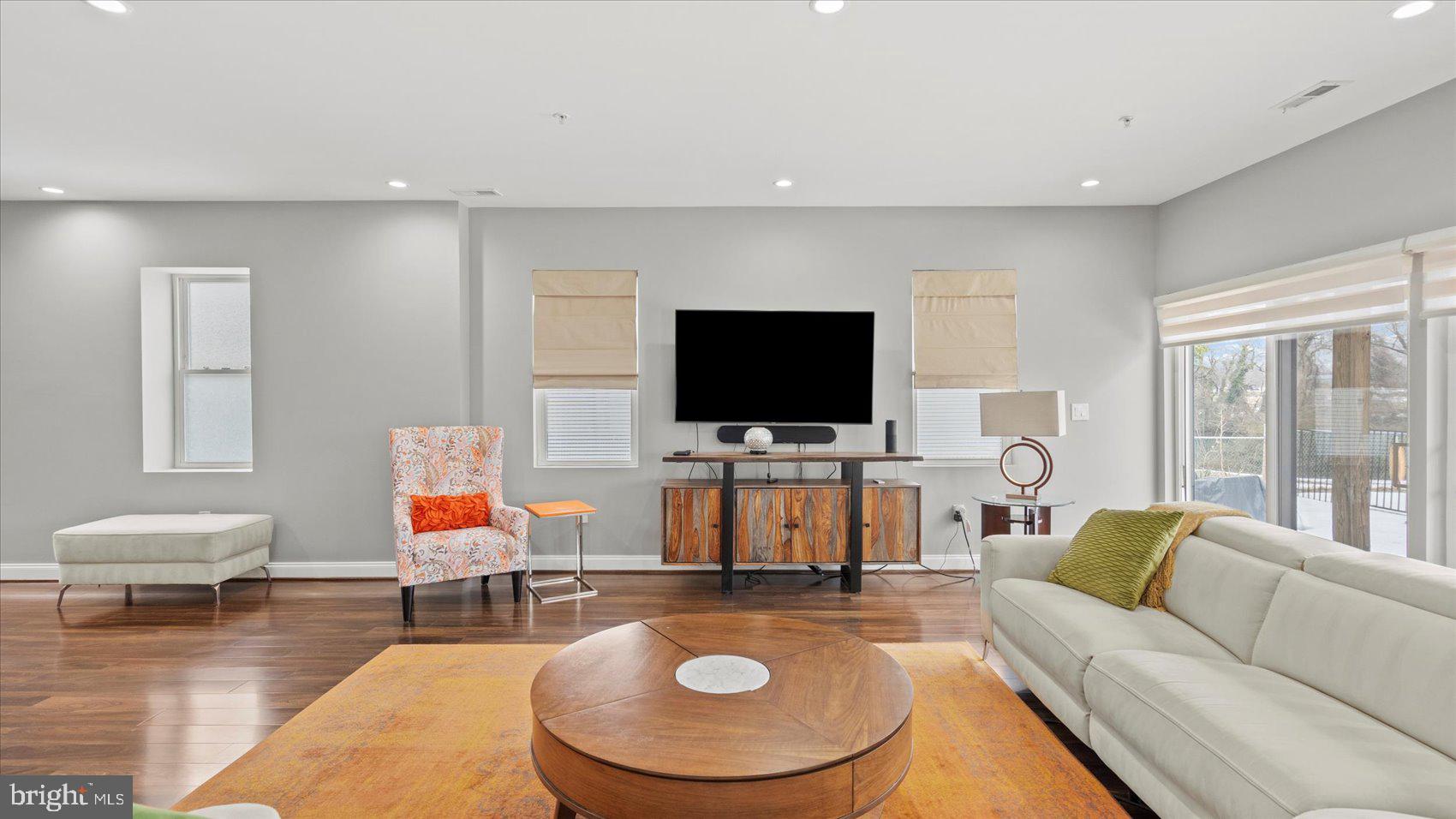 3145 Baybriar Road Dundalk, MD 21222 - Photo 29 of 54 a living room with furniture and a flat screen tv
