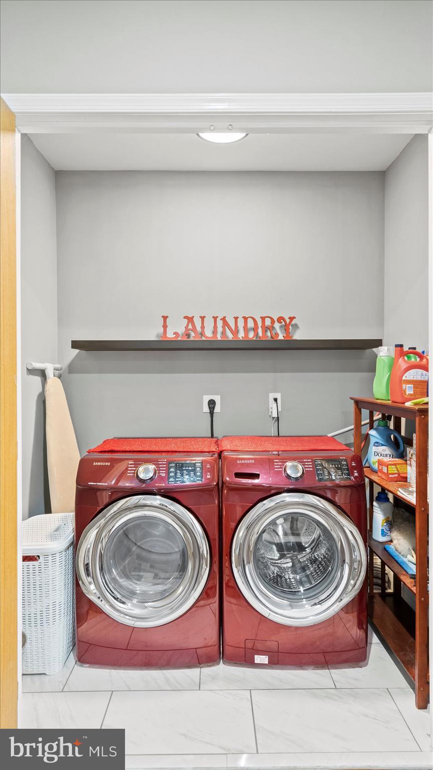 3145 Baybriar Road Dundalk, MD 21222 - Photo 35 of 54 a utility room with dryer and washer