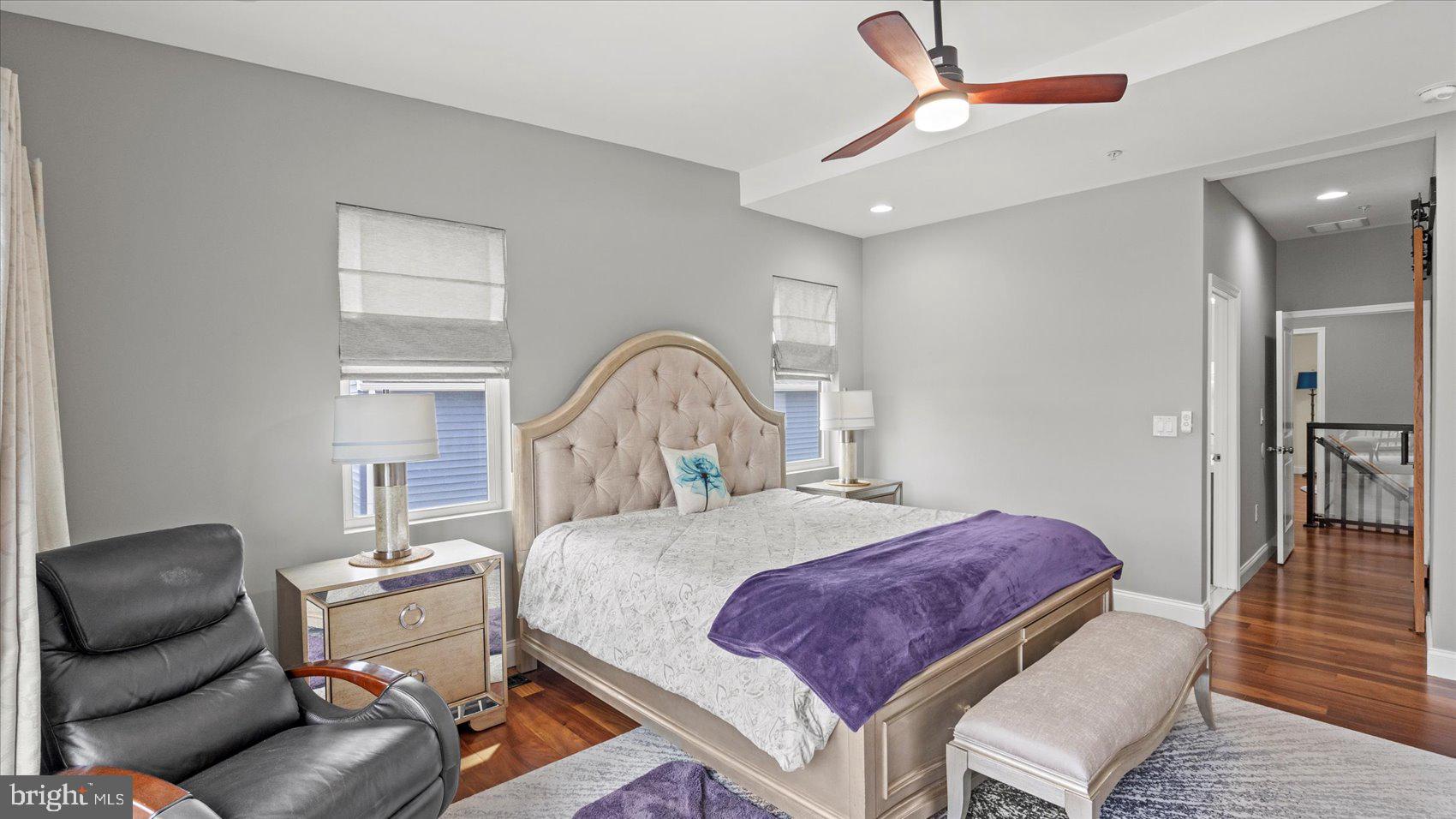 3145 Baybriar Road Dundalk, MD 21222 - Photo 37 of 54 a bedroom with a bed and wooden floor