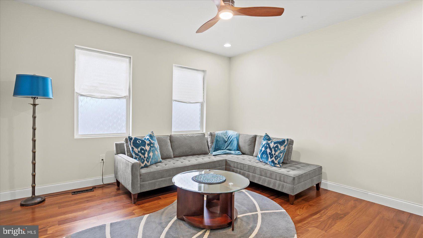 3145 Baybriar Road Dundalk, MD 21222 - Photo 39 of 54 a living room with furniture and a rug