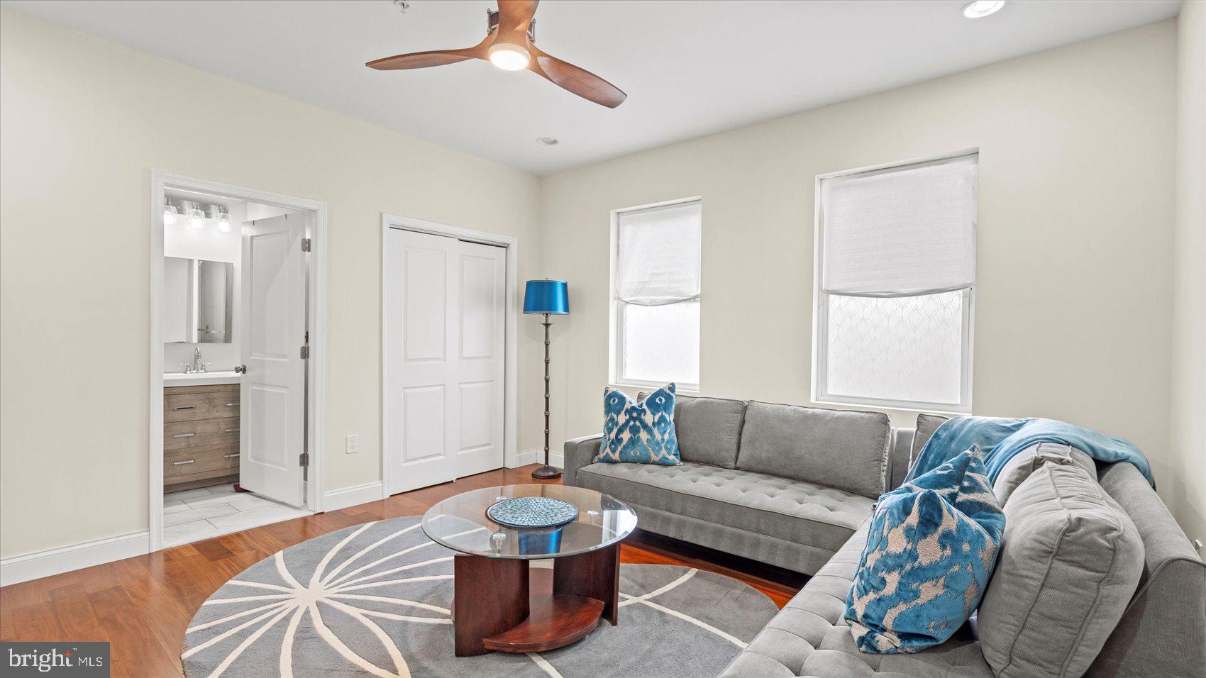 3145 Baybriar Road Dundalk, MD 21222 - Photo 40 of 54 a living room with furniture and wooden floor
